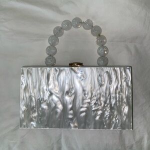 White acrylic clutch